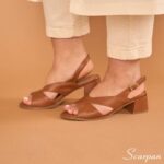 A Sandália de Couro Feminina da Scarpan com Salto Bloco de 4,5 cm é sinônimo de conforto, durabilidade e elegância. Primordialmente, ela foi projetada para mulheres que valorizam estilo e saúde. Confeccionada em couro legítimo, ela proporciona o toque macio e o ajuste ideal que seus pés merecem.