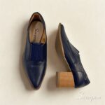 Abotinado em Couro Bota bico fino Salto Bloco. Referência: 106.174 Material Cabedal: Couro Material Forro: Têxtil Gênero: Feminino Salto: 6,5 cm Solado: TR ante derrapante