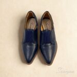 Abotinado em Couro Bota bico fino Salto Bloco. Referência: 106.174 Material Cabedal: Couro Material Forro: Têxtil Gênero: Feminino Salto: 6,5 cm Solado: TR ante derrapante