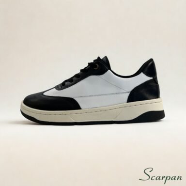 Foto em close de Tênis de Couro Feminino branco com preto Scarpan com solado flatform