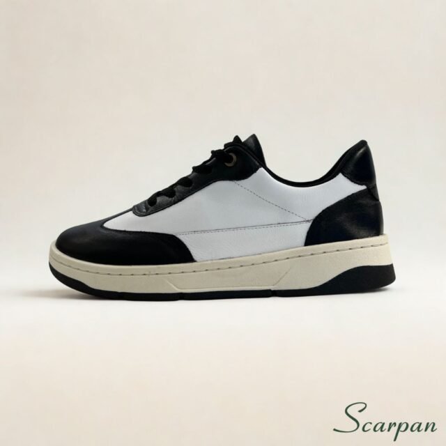 Foto em close de Tênis de Couro Feminino branco com preto Scarpan com solado flatform
