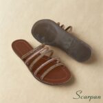 Sandália Rasteira Slide Slip On com Tiras de Pedraria e Strass Ouro e Rosê Scarpan. Solado em TR que é macio e aderente.