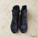 Visão superior da bota de couro cano curto feminina preta maya